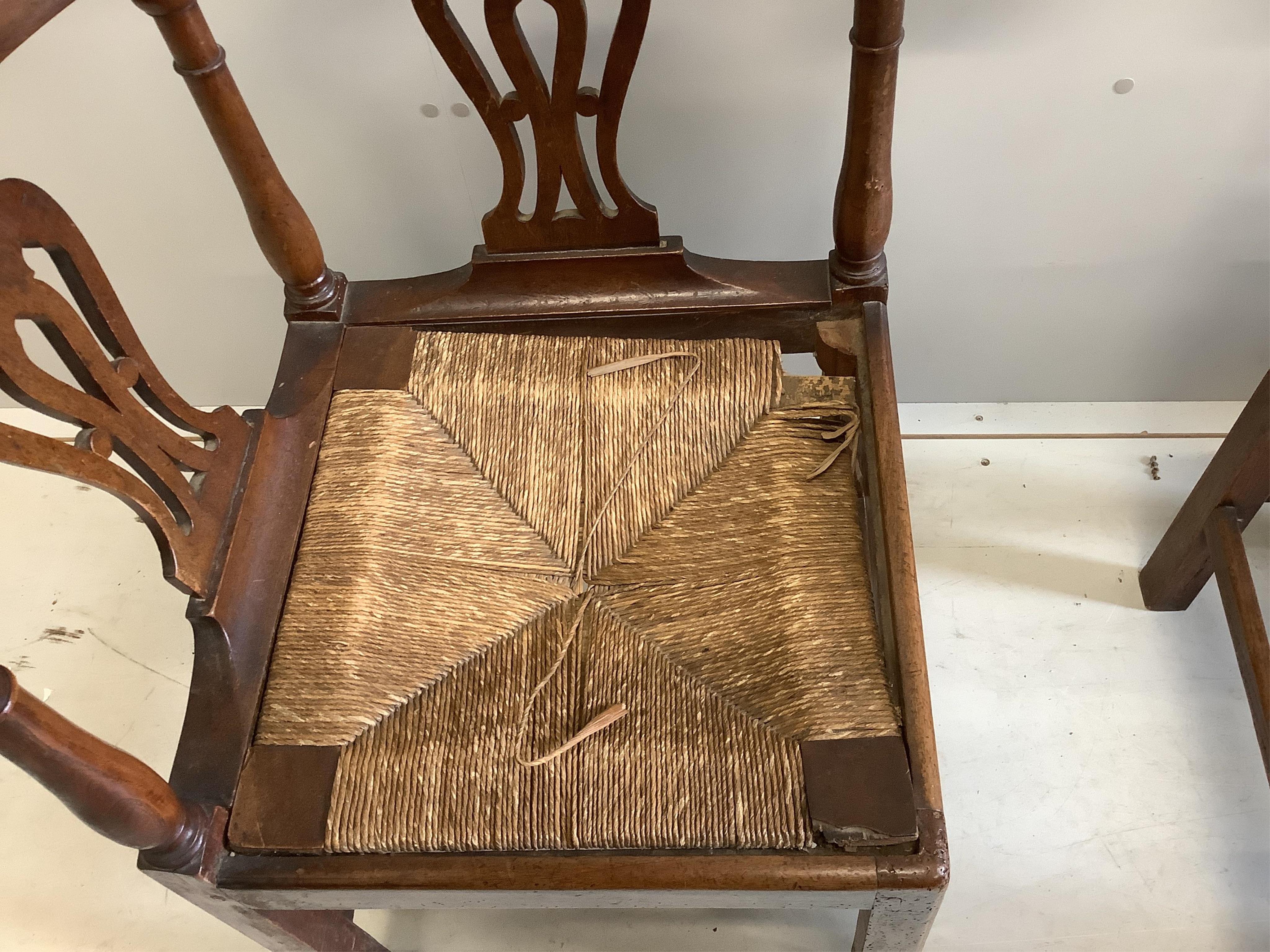 Two George III corner elbow chairs, one oak, one mahogany, larger width 76cm, depth 64cm, height 85cm. Condition - poor to fair